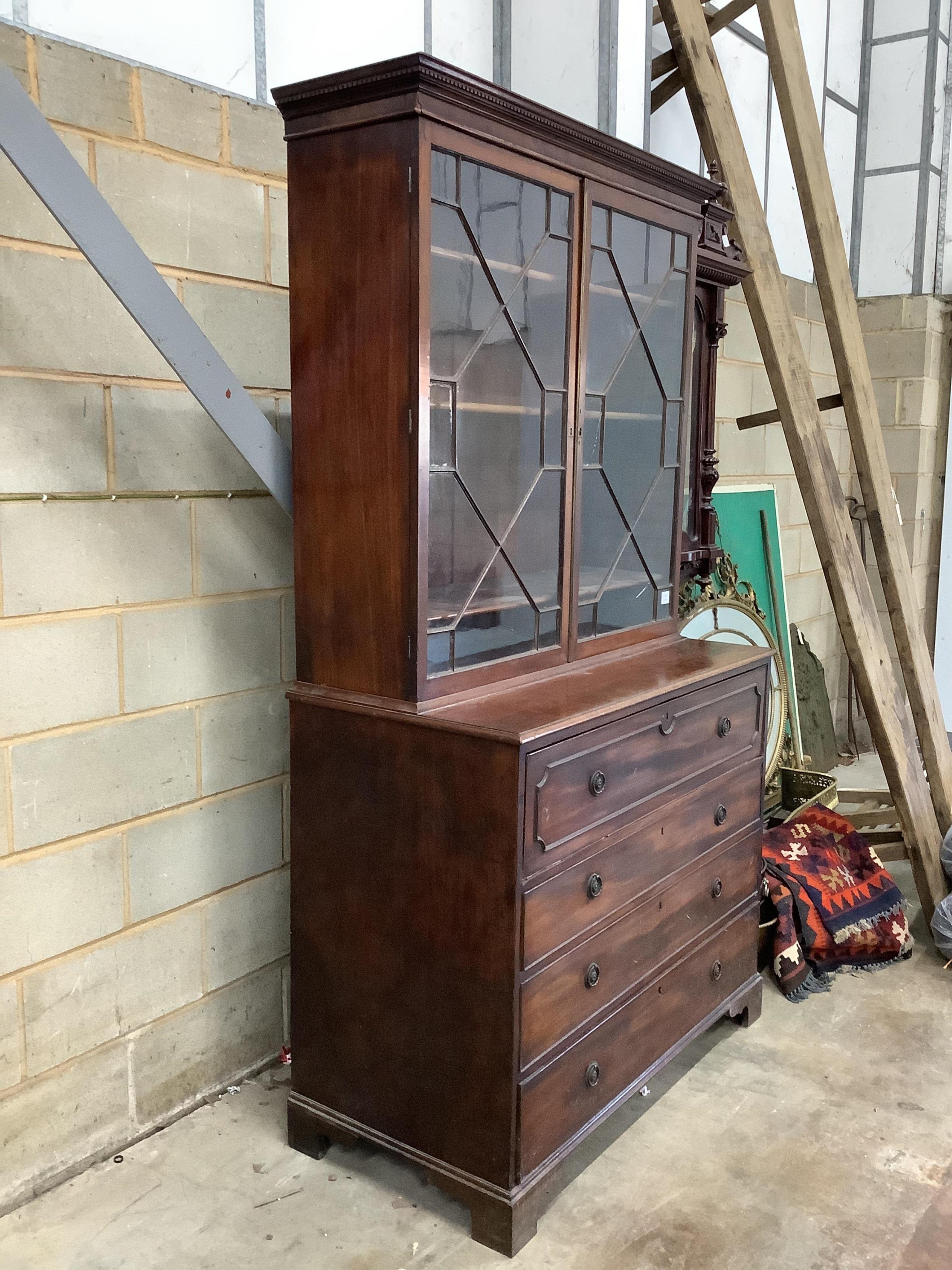 A Regency mahogany secretaire bookcase, width 116cm, depth 58cm, height 217cm. Condition - fair, two glass panes cracked